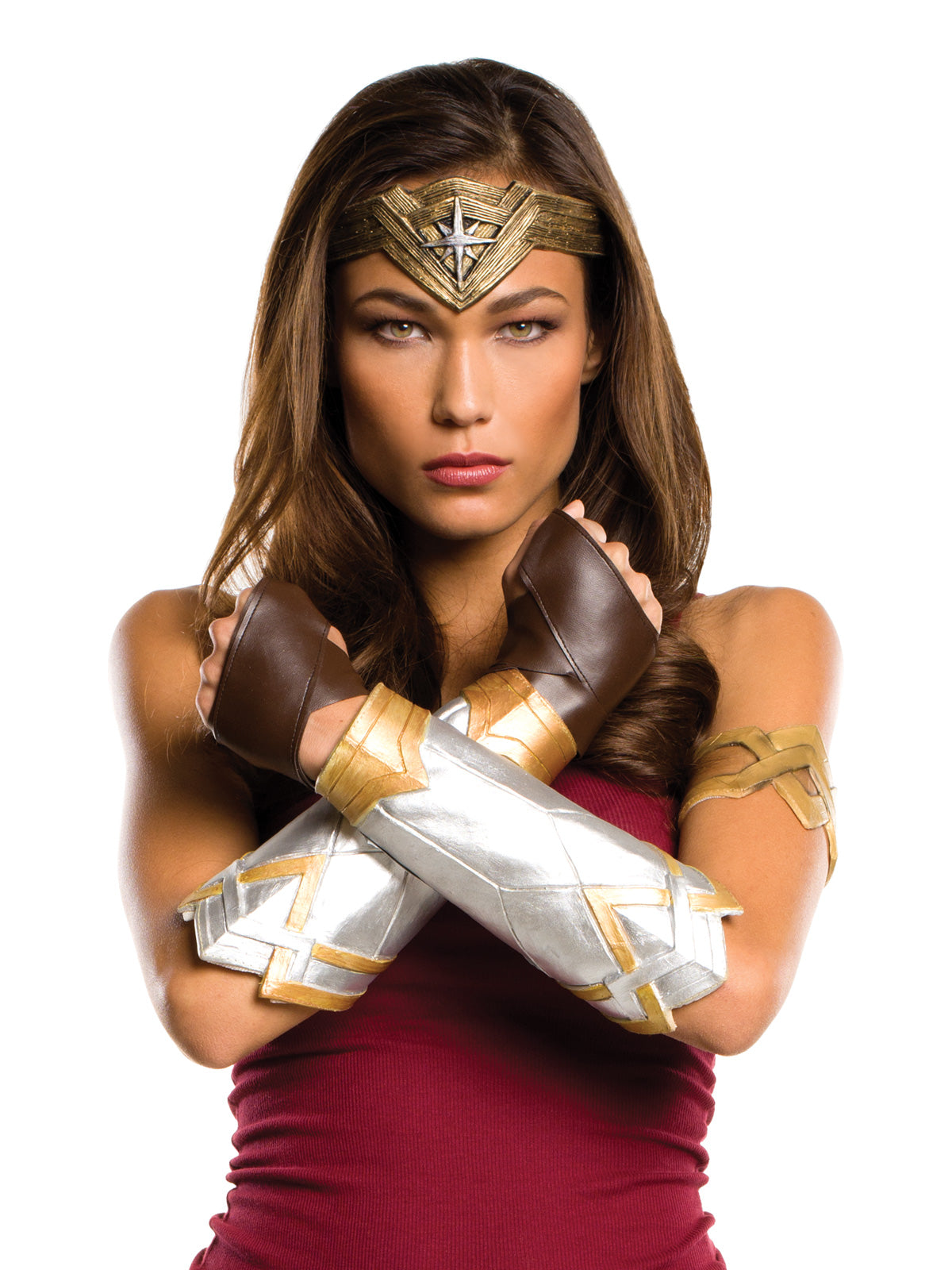 Woman wearing the Wonder Woman silver gauntlets and gold tiara