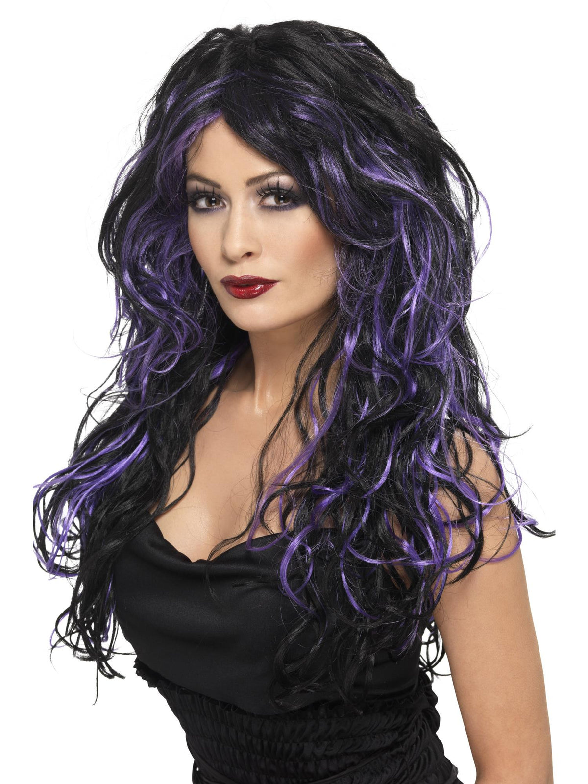 Woman wearing a long wavy black gothic bride wig with purple streaks