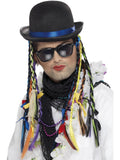 Man wearing a black bowler hat with blue band and attached multicoloured braided hair