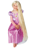 Girl wearing the very long straight blonde Rapunzel glow in the dark wig