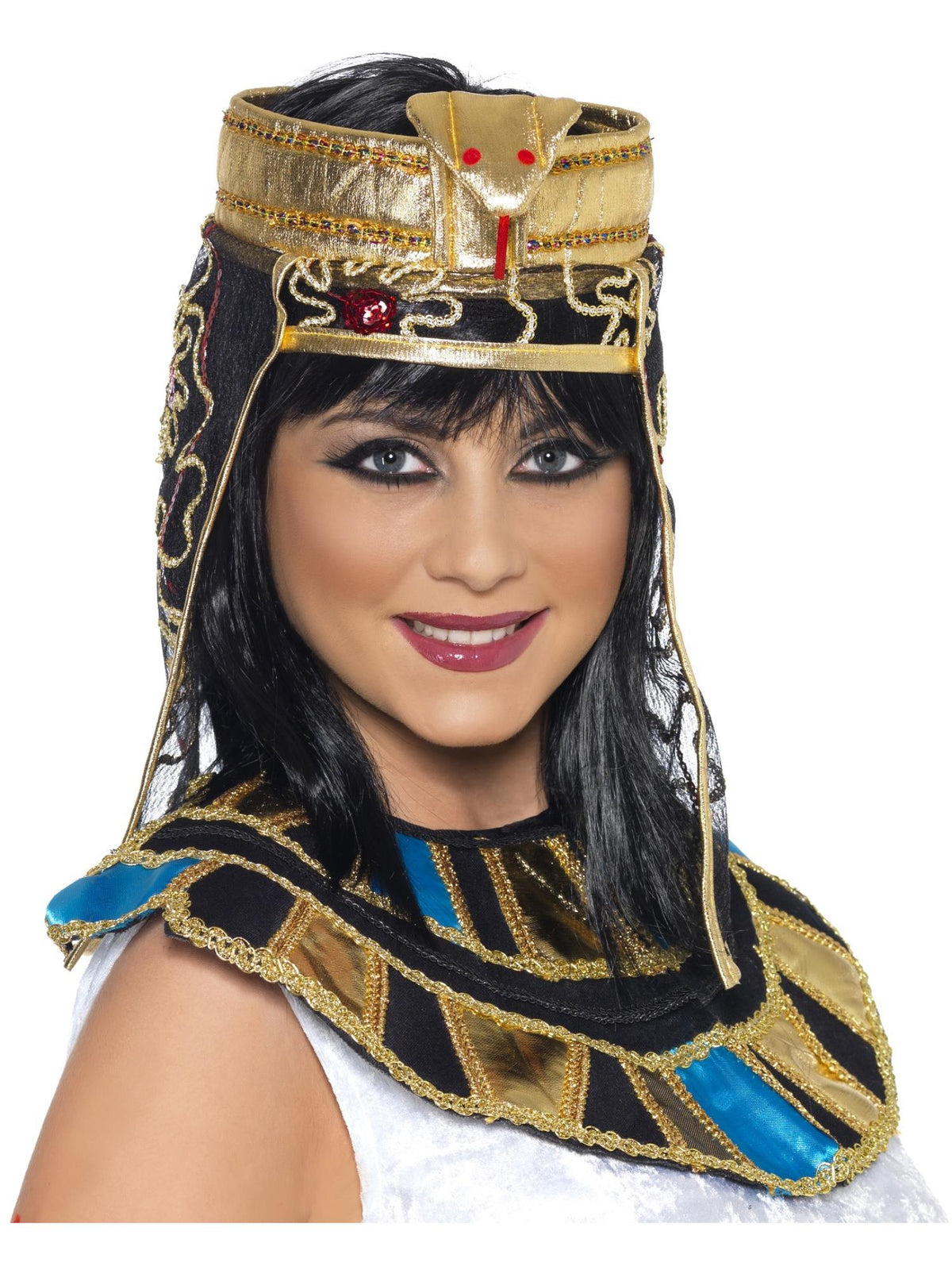 Woman wearing a gold Egyptian headdress with snake emblem