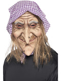 Old witch latex mask with wrinkled face, long nose, grey hair and purple checked headscarf