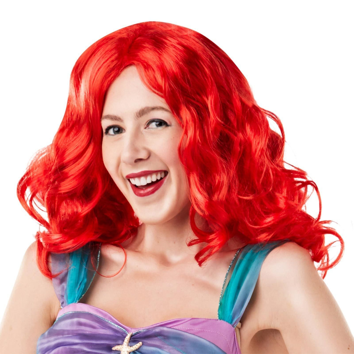 Woman wearing the long wavy bright red Ariel wig
