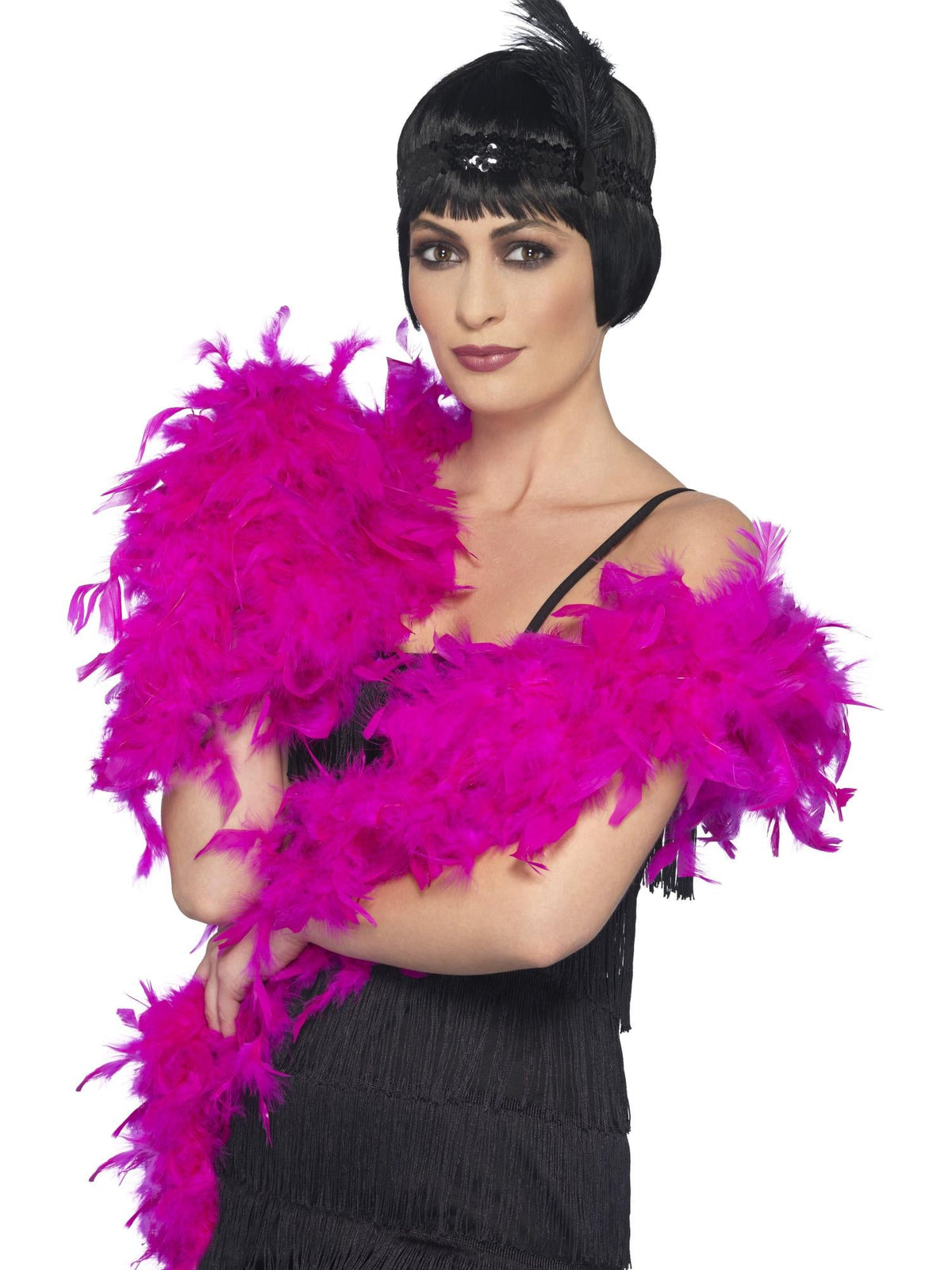 Woman wearing a deluxe fuchsia pink feather boa draped over her arms