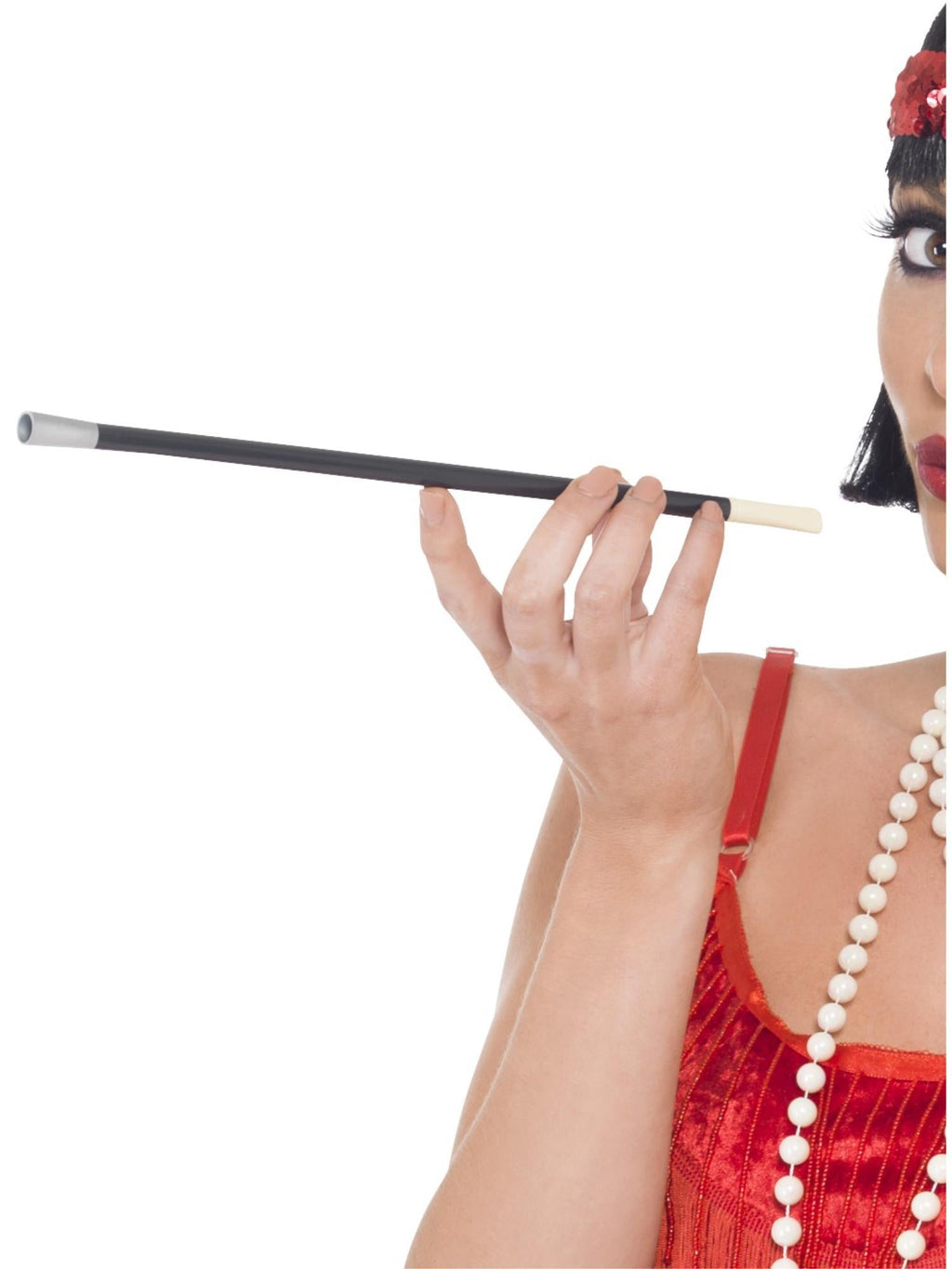 Hand holding a black flapper cigarette holder with silver mouthpiece and white tip