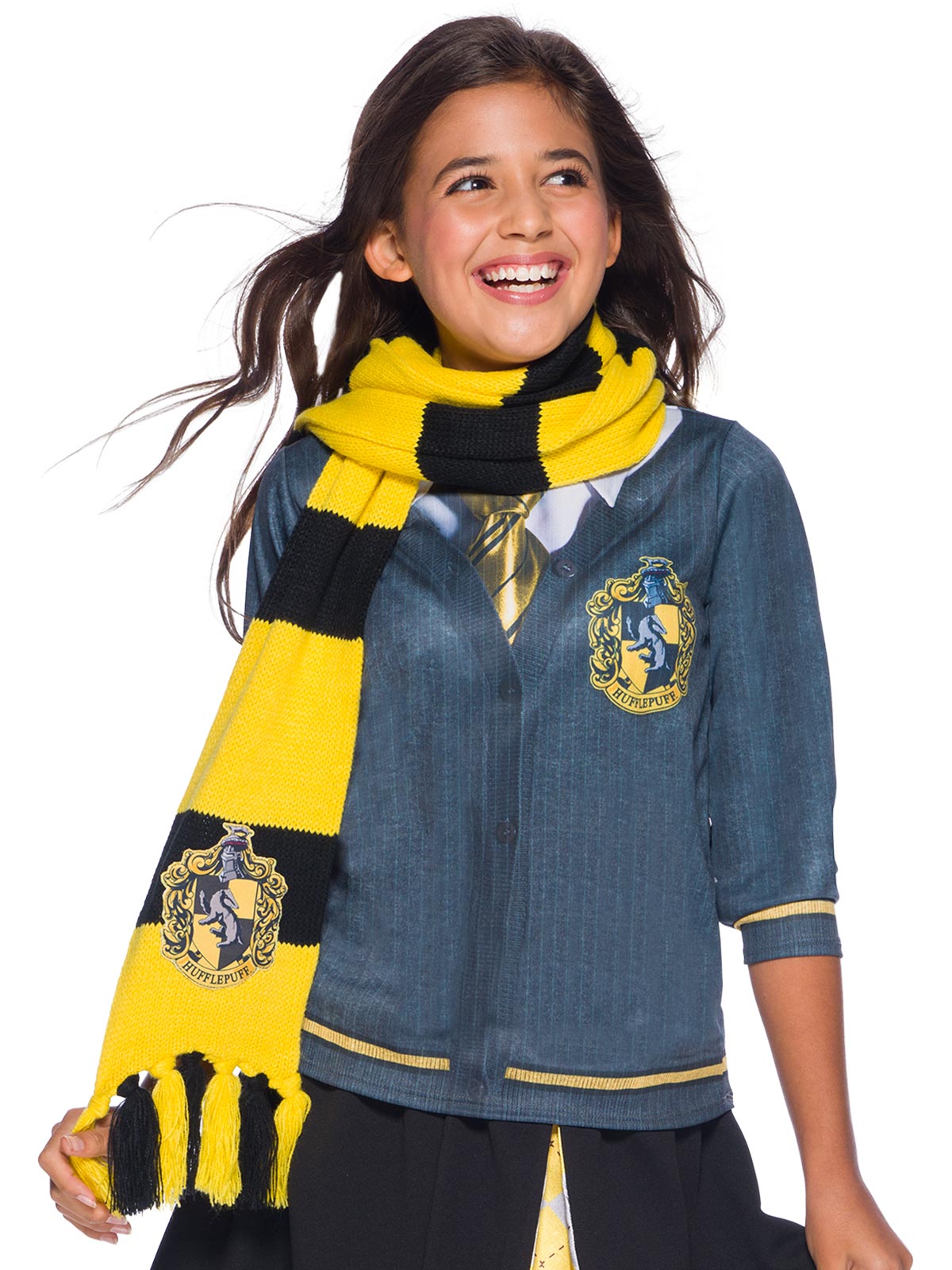Girl wearing a yellow and black striped Hufflepuff knit scarf with house emblem