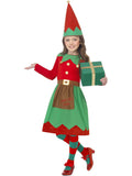 Girl wearing a red and green Santa's Little Helper elf dress with gold buttons, belt and pointed elf hat