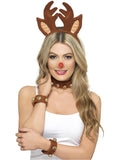 Woman wearing felt reindeer antler ears on a headband with a bell collar and cuffs