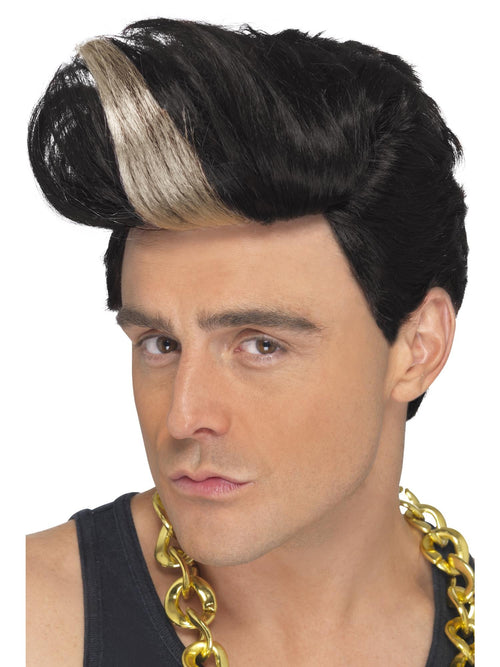 Man wearing a black 90s rapper wig with tall quiff and blonde streak