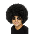 Man wearing a big curly black 70s afro wig