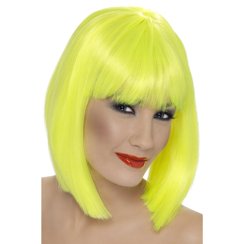 Woman wearing the Desire wig in neon yellow with a full fringe and a chin-length cut