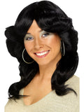 Woman wearing a black wavy layered 70s flick wig