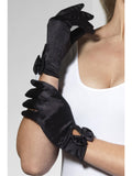 Hands wearing short black satin gloves with bows at the wrist