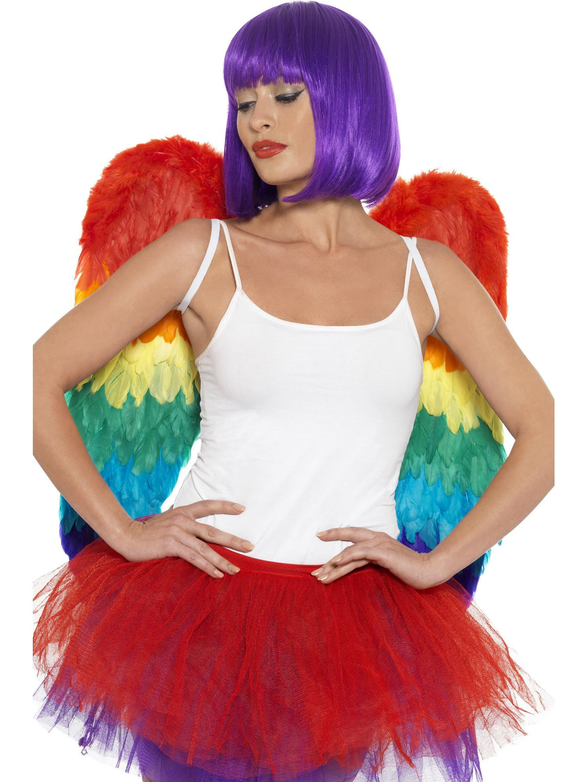 Woman wearing large rainbow feather wings with shoulder straps