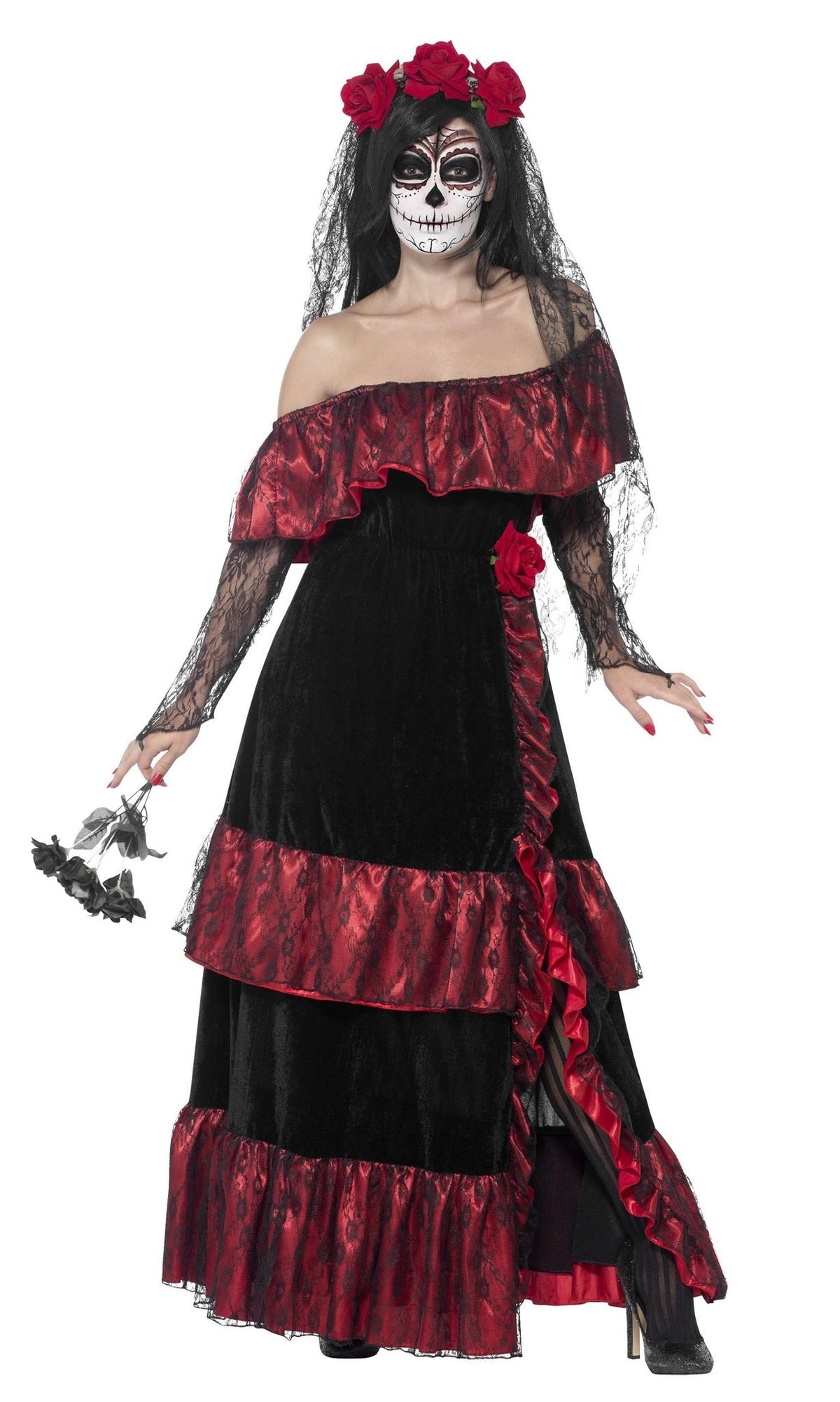 Woman wearing a black and red dress with floral headpiece on a white background
