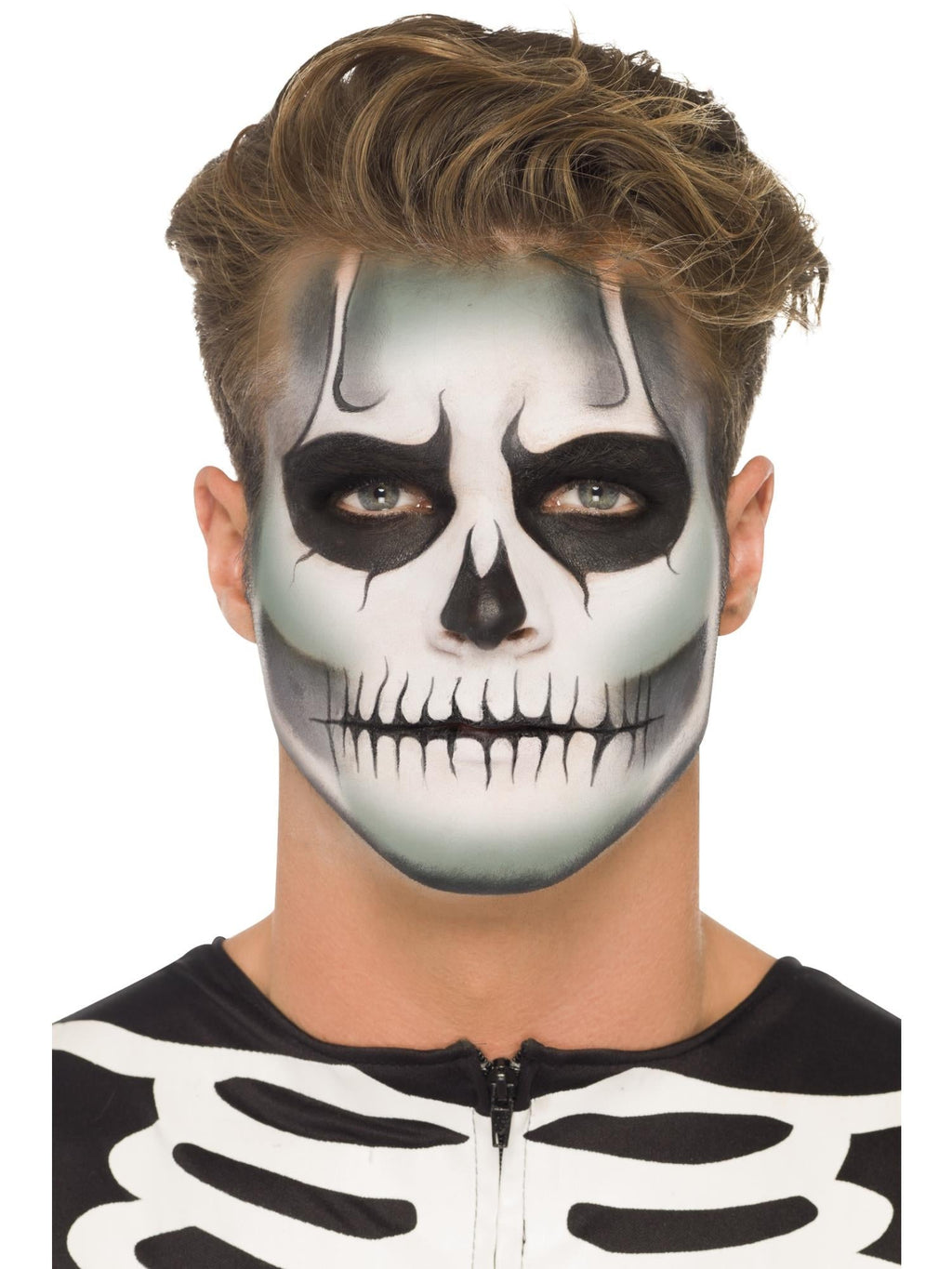 Man with black and white skeleton face paint created with the kit