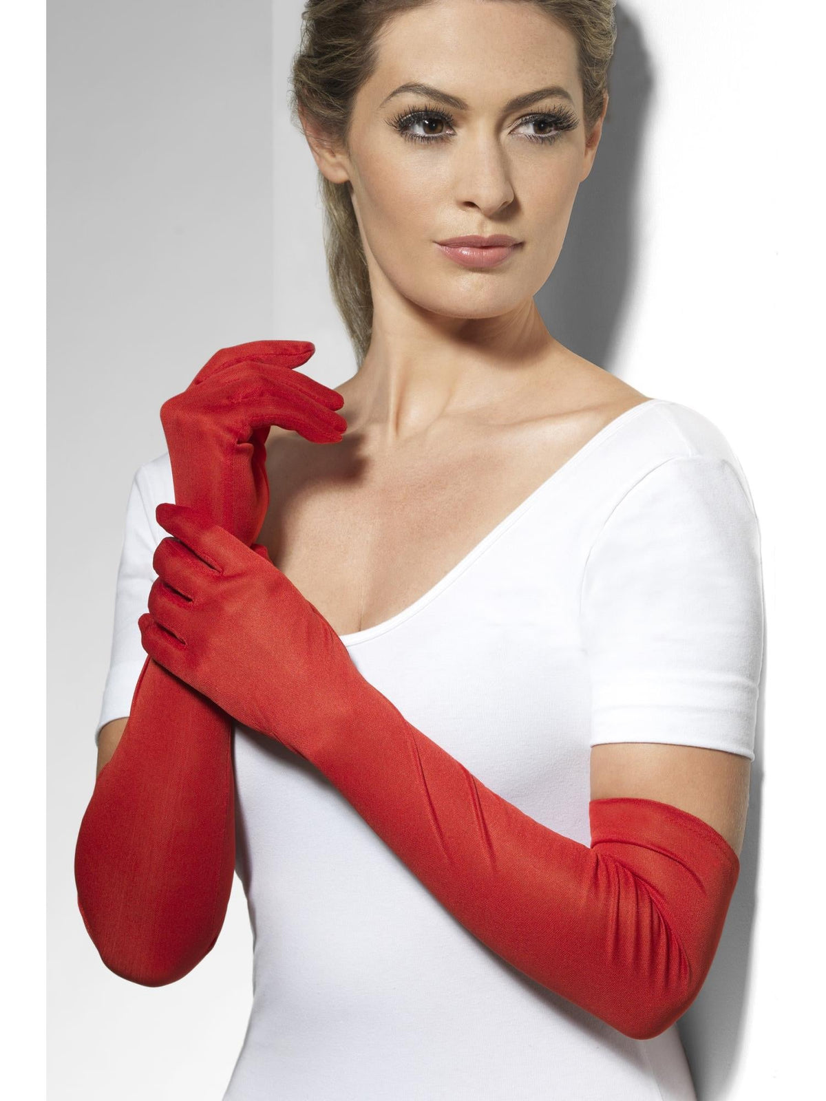 Woman wearing long red satin gloves