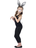 Girl wearing grey bunny ears headband, bunny nose with whiskers and fluffy white tail