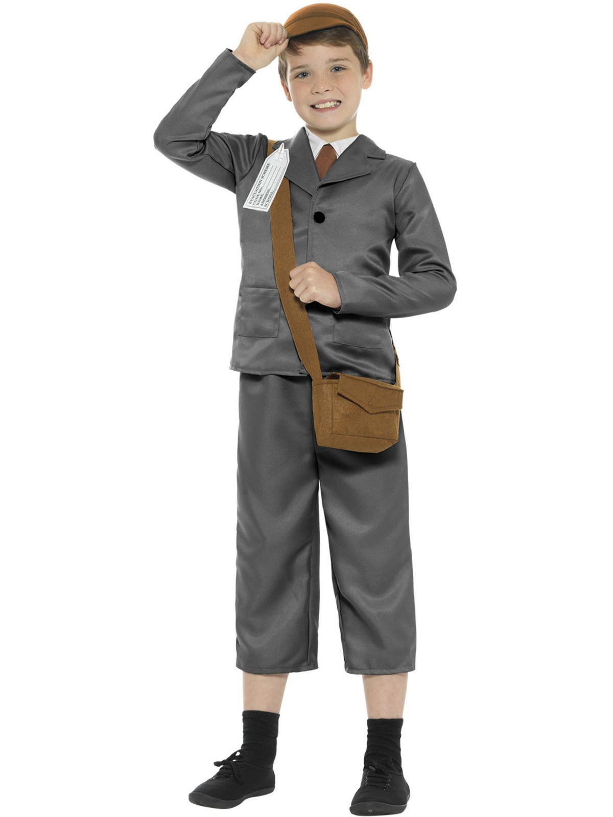 Boy wearing a grey WW2 evacuee jacket with mock shirt, 3/4 pants, brown cap and satchel with ID tag