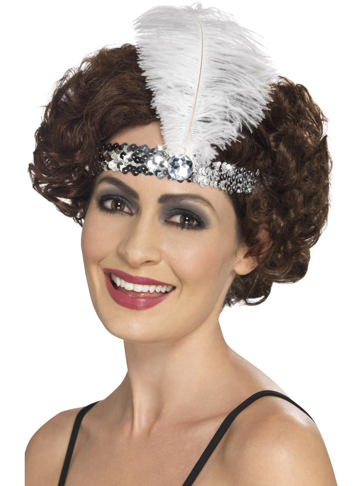Woman wearing a silver sequin flapper headband with a white feather