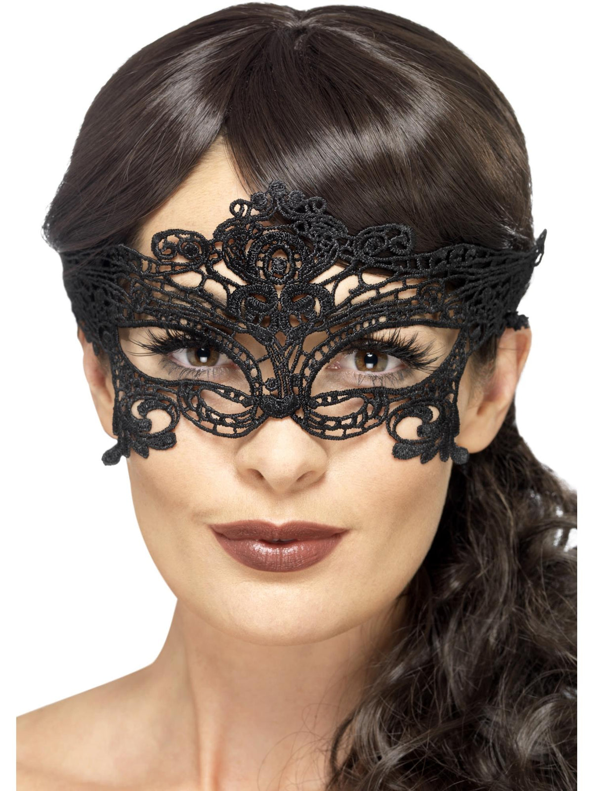 Woman wearing a black filigree lace eyemask with heart shapes