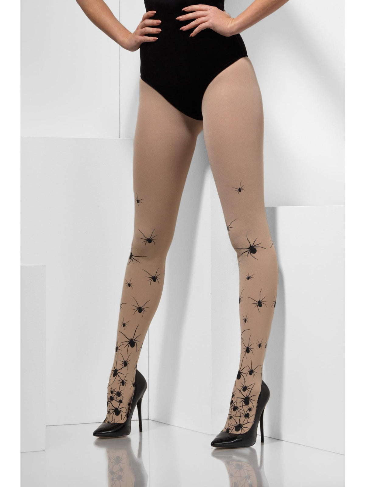 Legs wearing sheer nude tights with black spider print