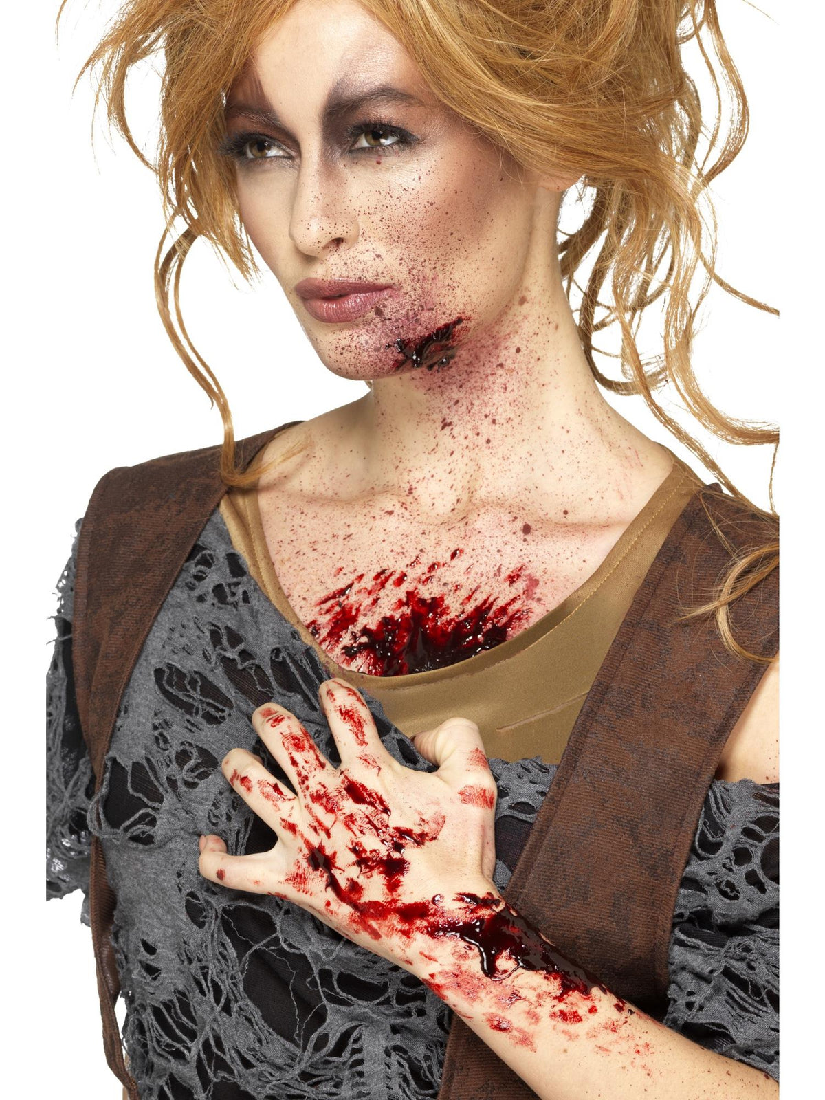 Woman with dark red scab blood effects on her face, chest and hand