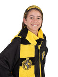 Girl wearing the striped Hufflepuff headband and yellow and black knit scarf