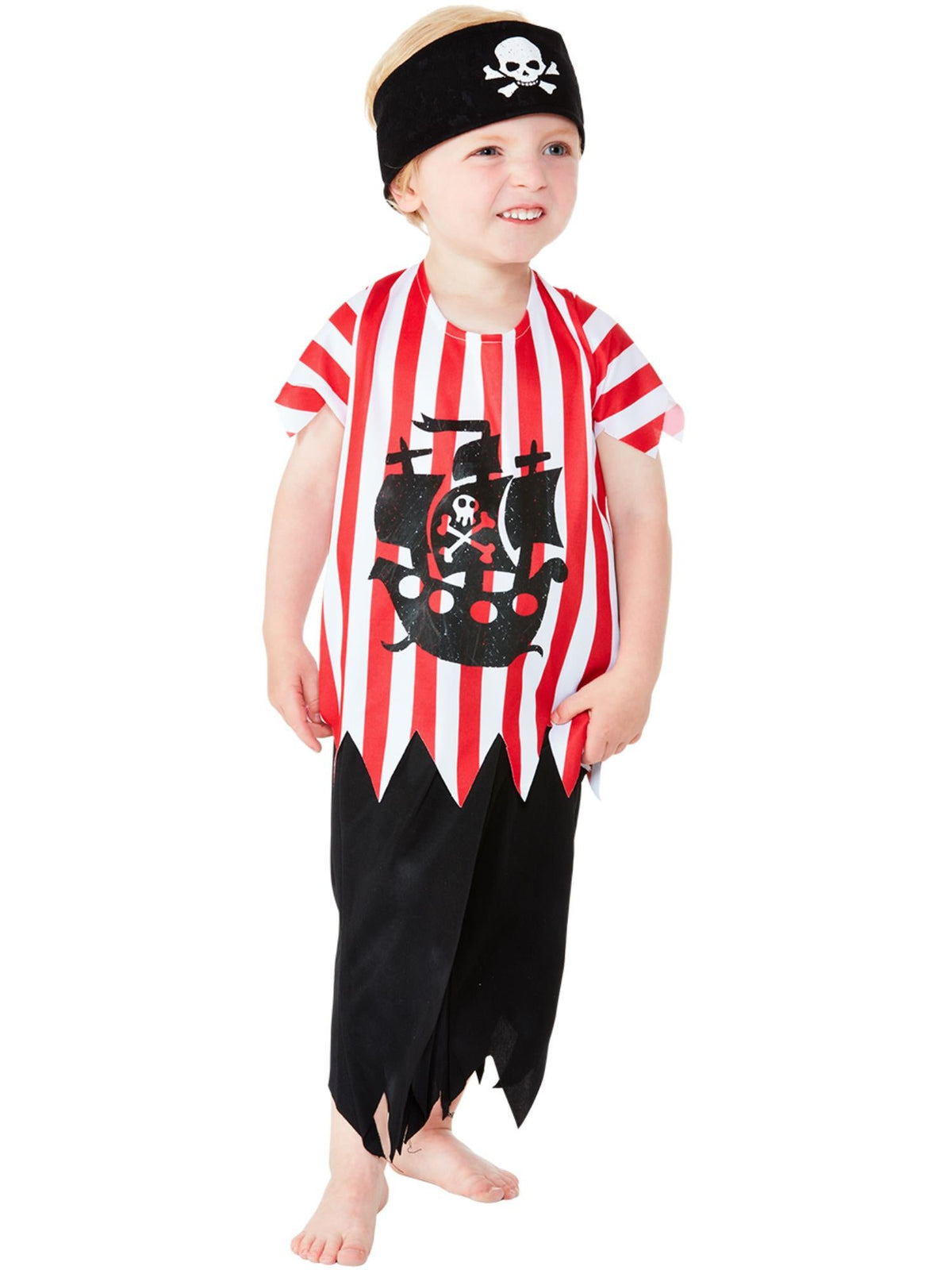 Toddler smiling in the red and white striped Jolly Pirate top, black pants and skull and crossbones bandana