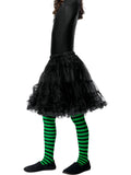 Child's legs wearing green and black striped witch tights