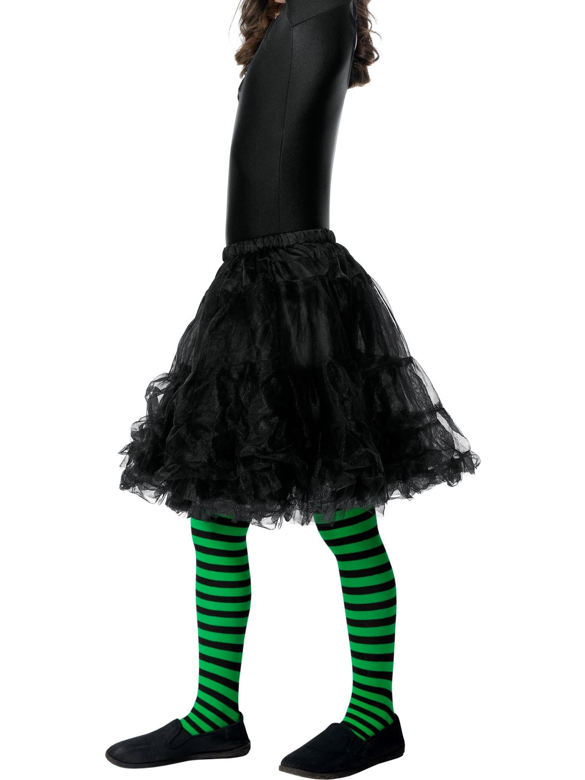 Child's legs wearing green and black striped witch tights