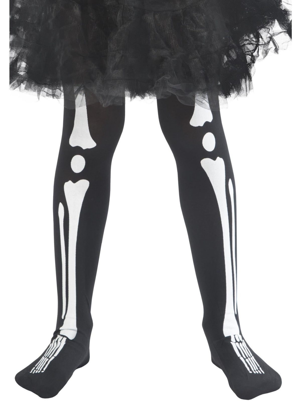 Child's legs wearing black tights with white skeleton bone print