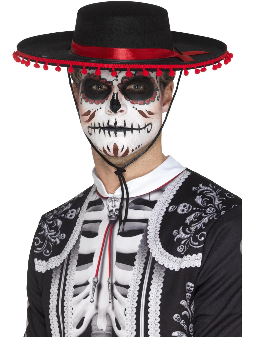 Man wearing a flat black Day of the Dead senor hat with red band and pom pom trim
