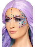 Woman wearing multi-coloured jewel face gems across her forehead and cheek
