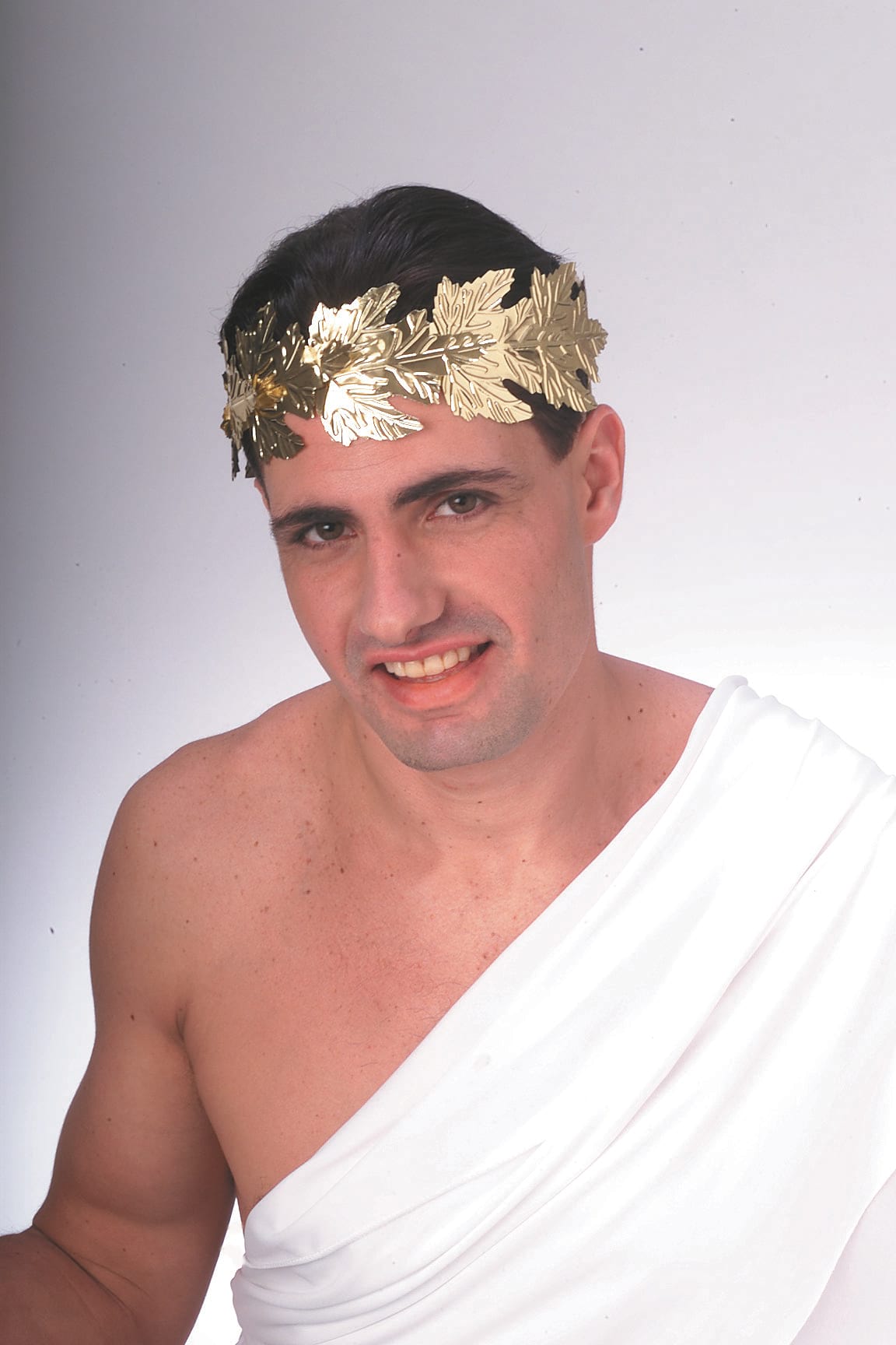 Man wearing a gold Roman leaf wreath headpiece