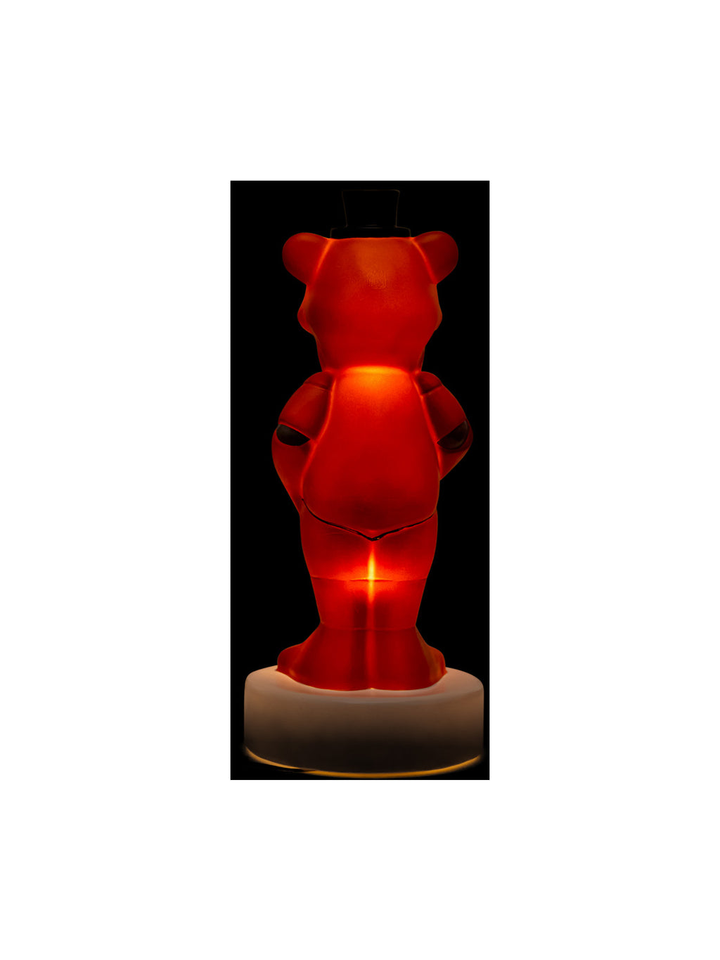 Close view of the Freddy figure lit up red in the dark