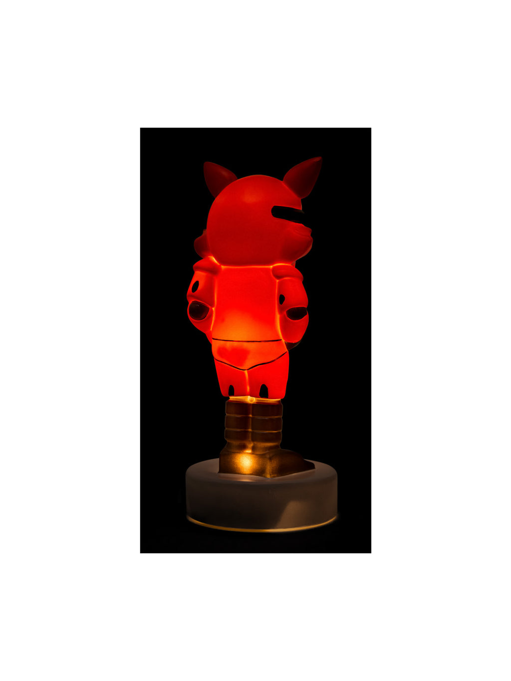 Side view of the Foxy figure lit up red in the dark