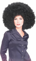 Woman wearing a huge curly black afro wig