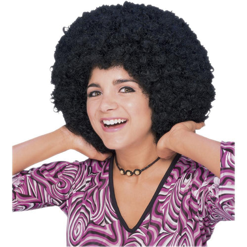 Woman wearing a big black curly afro wig