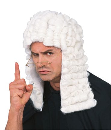 Man wearing a white rolled-curl judge wig