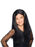 Girl wearing a long straight black witch wig