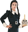 Girl wearing a long black plaited Wednesday Addams wig