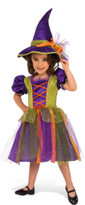 Girl wearing a purple and green pumpkin witch dress with glittery tulle skirt and witch hat with pumpkin