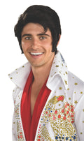 Man wearing a short black Elvis wig with sideburns and swept fringe