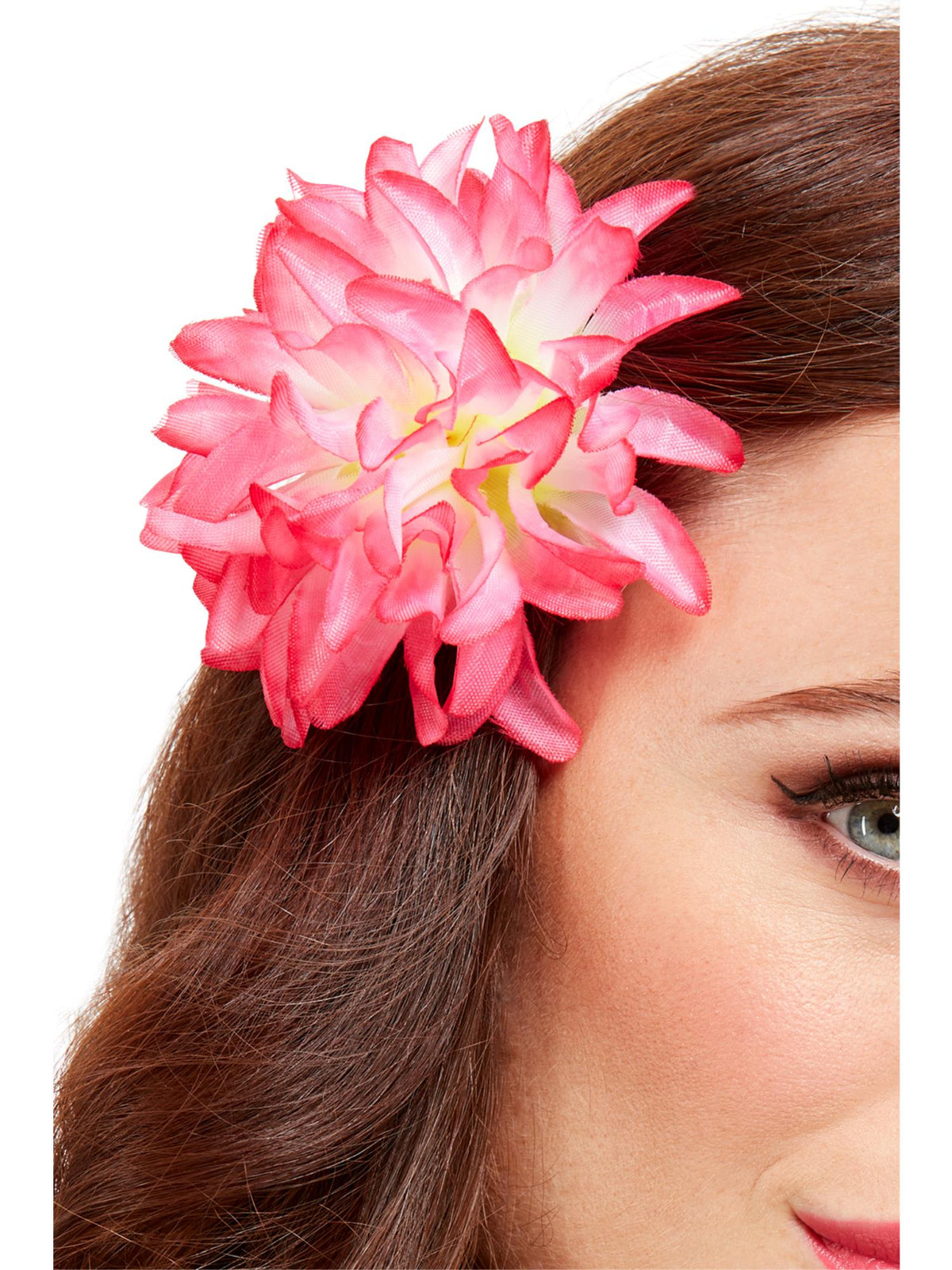 Pink and white Hawaiian flower hair clip worn in long brown hair