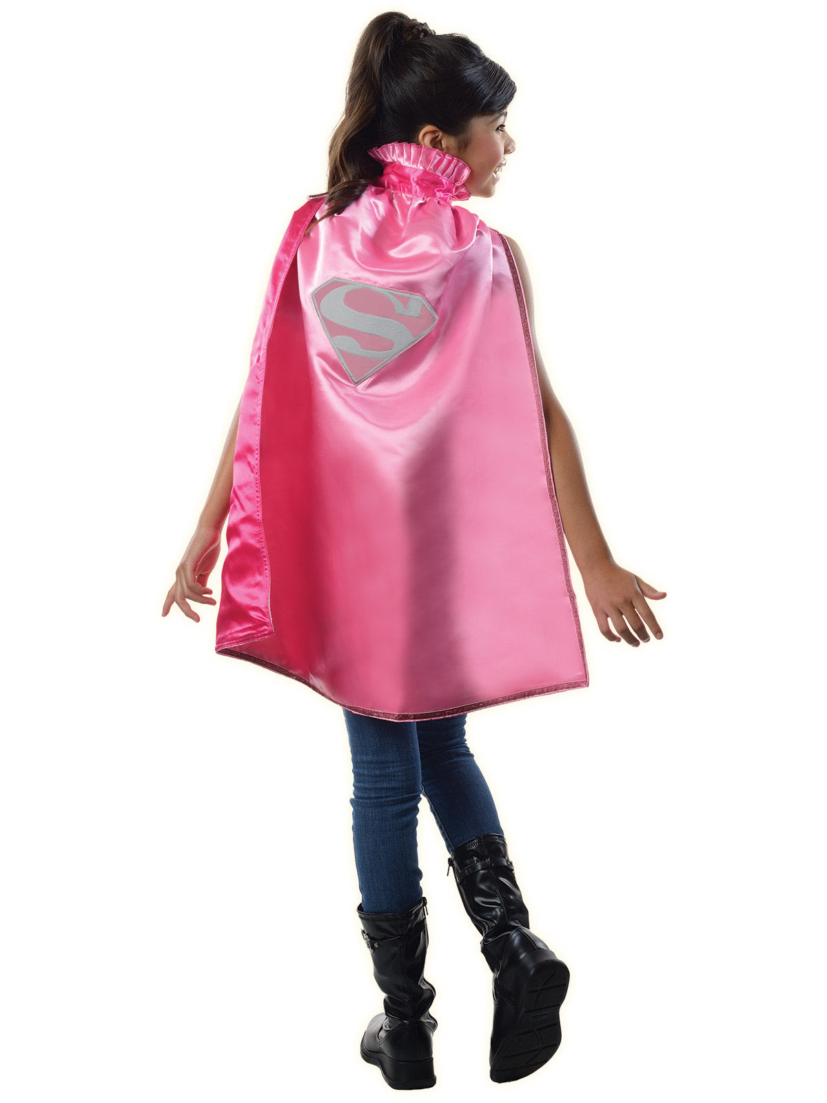 Back view of a girl wearing the pink Supergirl cape with large logo