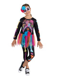 Girl wearing a neon skeleton jumpsuit with colourful flower bones, rainbow mesh tutu and floral eye mask