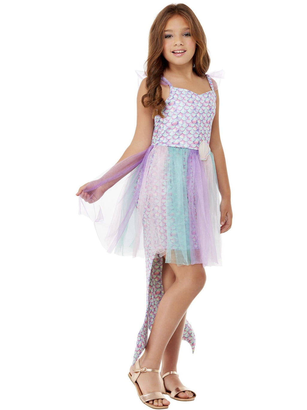 Side view of a girl in the seashell mermaid dress showing the attached mermaid tail