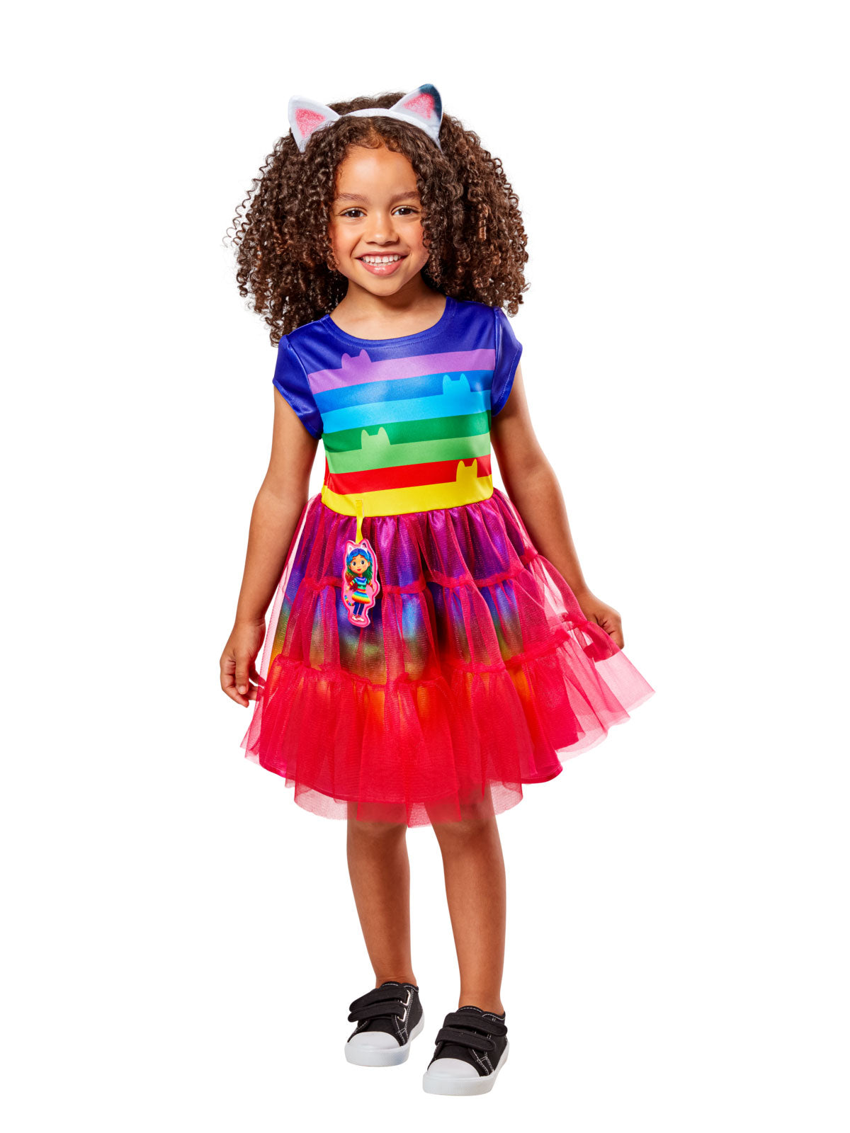 Girl in the Gabby's Dollhouse Rainbow Deluxe dress with rainbow stripes, red tulle skirt and cat ear headband