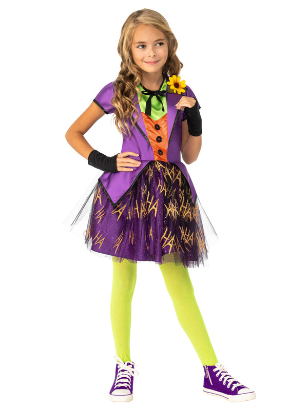 Girl wearing a Joker tutu dress with purple printed bodice, mock vest, yellow flower, glitter tulle skirt and glovelettes